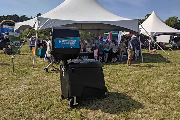 power breezer max evaporative cooler by a tent