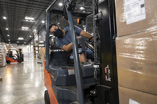 warehouse worker on forklift